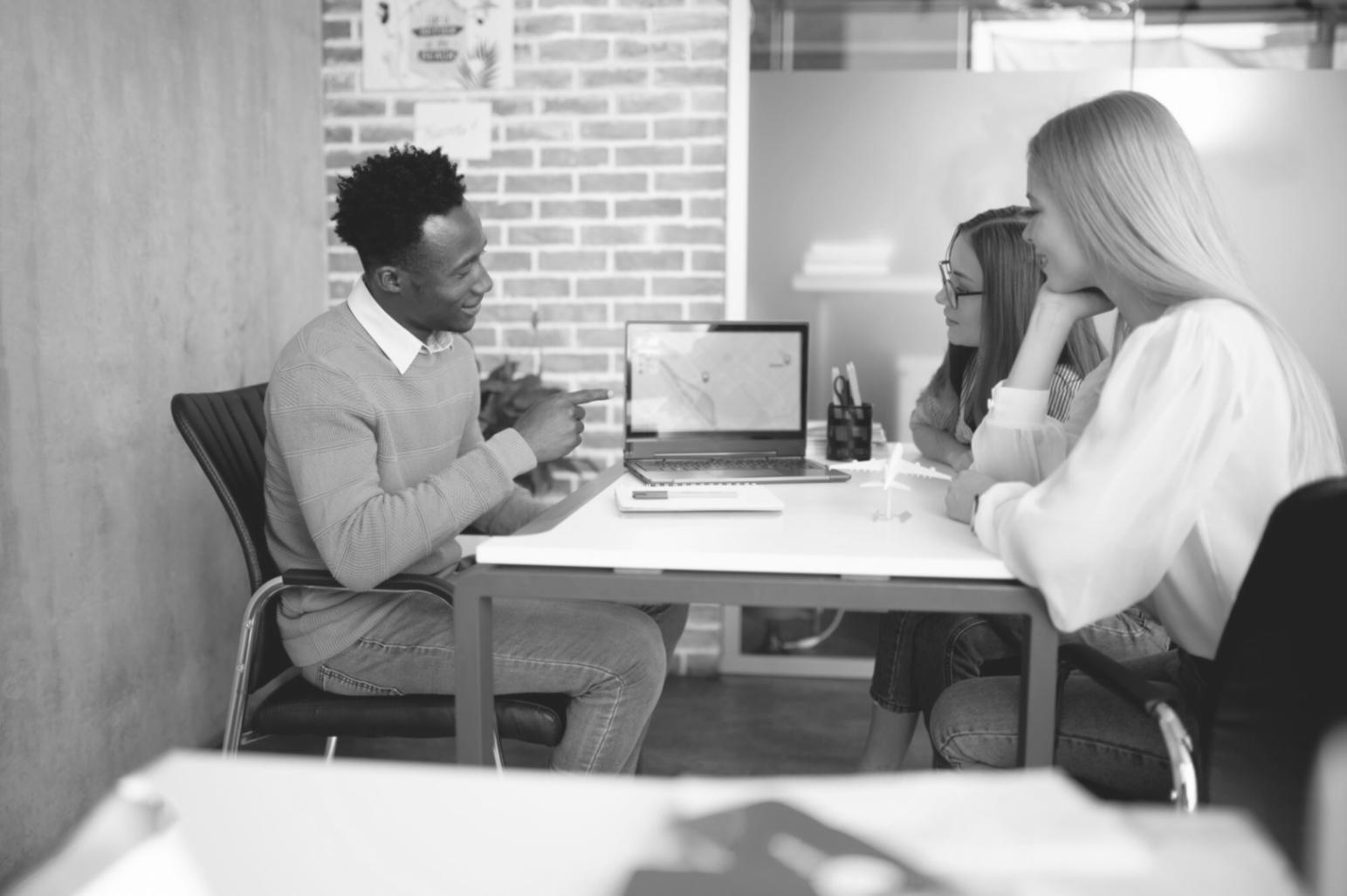 Interactive banking workshop session with participants collaborating on financial analysis exercises