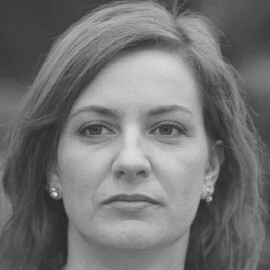 Professional headshot of financial education coordinator